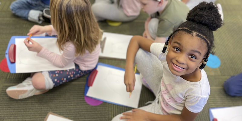 Student in young fives classroom